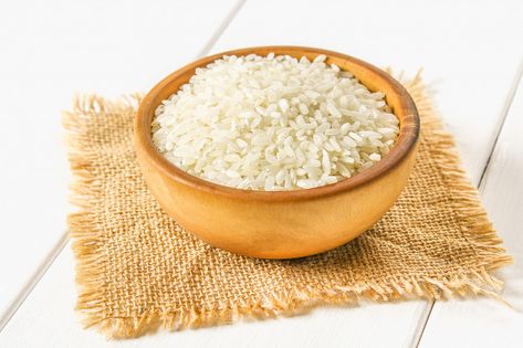 Grains of raw white rice on a white wooden table of boards. ingredients for cooking. Premium Photo | Premium Photo #Freepik #photo #food #nature #table #farm Veg Pulao, Parboiled Rice, Gold Bowl, Rice Varieties, Photo Food, Red Rice, Food Clips, Indian Sweet, South Indian Food