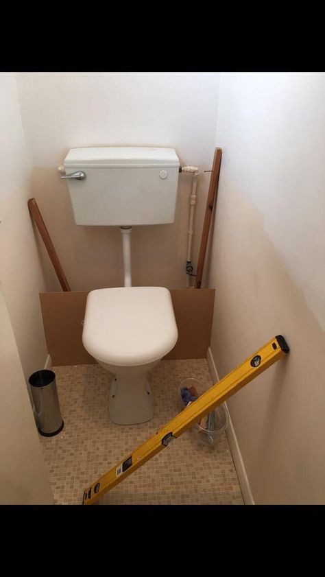 Woman upgrades toilet for just £100 and here's how | LatestDeals.co.uk Cloakroom Toilet Downstairs Loo, Small Toilet Decor, Toilet Remodel, Diy Kast, Small Toilet Design, Toilet Closet, Wc Ideas, Hidden Toilet, Small Downstairs Toilet