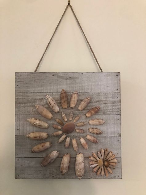 Seashell wall hanging hand made with seashells from Holden Beach  and Ocean Isle Beach in North Carolina. Things To Make With Seashells, Things To Do With Sea Shells, Shell Art Projects, Diy Ocean Decor, Seashell Wall Hanging, Succulent Wreath Diy, Sand Dollar Craft, Seashell Wall Decor, Driftwood Art Sculpture