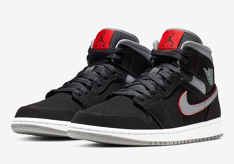 Jordan Brand is dressing up their Air Jordan 1 Mid in the brands popular Black, Grey, and Red color combo. This release sports a Black nubuck upper with Grey leather Swoosh logos on the sides, ankle collar and inner lining. Red is used on the outline of the Swoosh, tongue labels, and insoles completed with … Jordan 1 Mid Black, Air Jordan 1 Mid Black, Looks Hip Hop, Jordan Shoes Retro, All Nike Shoes, Nike Air Jordan 1 Mid, Swag Shoes, Air Jordan Shoes, Air Jordan 1 Mid