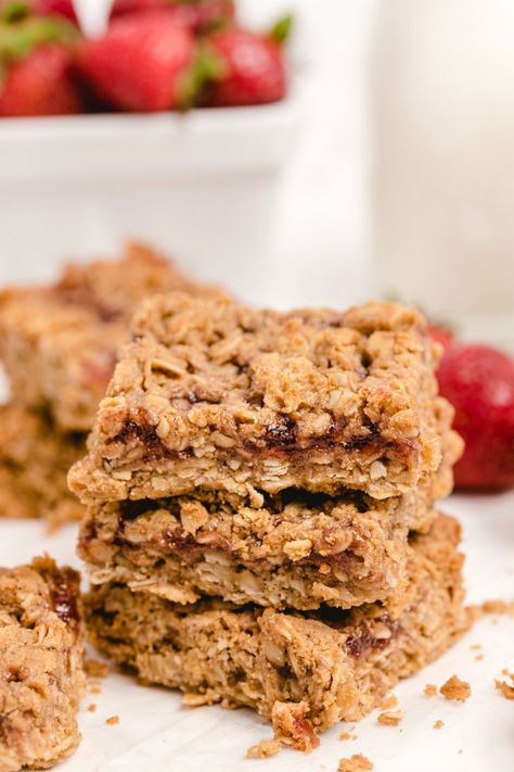 Peanut Butter and Jelly Granola Bars recipe from RecipeBoy.com #peanut #butter #peanutbutter #PB #jelly #peanutbutterandjelly #granola #bars #granolabars #recipe #RecipeBoy Pbj Oatmeal Bars, Chewy Peanut Butter Granola Bars, Peanut Butter And Jelly Granola, Granola Bars Homemade Crunchy Peanut Butter, Best Granola Bars, Granola Bars Recipe, Joy Bauer No-bake Peanut Butter Granola Bars, Best Granola, Granola Recipe Bars