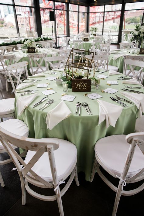 We adore this mint green and white wedding color palette! The large windows at The Bridge Building let the natural light pour in which is so beautiful against the pretty details! Click the image to learn more about this Nashville wedding venue! | SheHeWe Photography Table Settings Quinceanera, Sage Sweet 16 Theme, Sage Green Quince Table, Green Xv Decorations, Sage Green Decor Quince, Mint Green Quinceanera Ideas, Mint Green Quinceanera Decorations, Green Sweet Sixteen Decorations, Pastel Green Quinceanera Theme