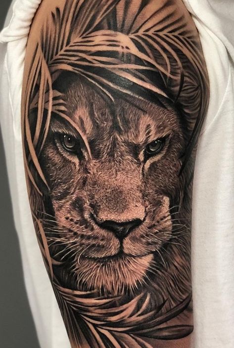 Because animal tattoos are today's skin-ink favorite, we’re going to help you navigate through the jungle of ink ideas, bringing you the most beautiful lion tattoos the internet has ever seen. We’ve compiled a beautiful gallery with some amazing tattoos, explaining the meanings behind this popular tattoo choice! #mentattoo #tattooideas Leo Lion Tattoos, Lion Arm Tattoo, Lion Shoulder Tattoo, Shoulder Armor Tattoo, Lion Forearm Tattoos, Jungle Tattoo, Cool Shoulder Tattoos, Animal Sleeve Tattoo, Lion Tattoo Sleeves