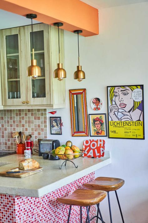 Ash An African Eye Nairobi Apartment Tour Photos | Apartment Therapy Overhead Cabinet, Rainbow House, Kitchen Wall Cabinets, Open Plan Living Room, Apartment Tour, Laundry Area, Apartment Kitchen, Tiny Kitchen, Vintage Table Lamp