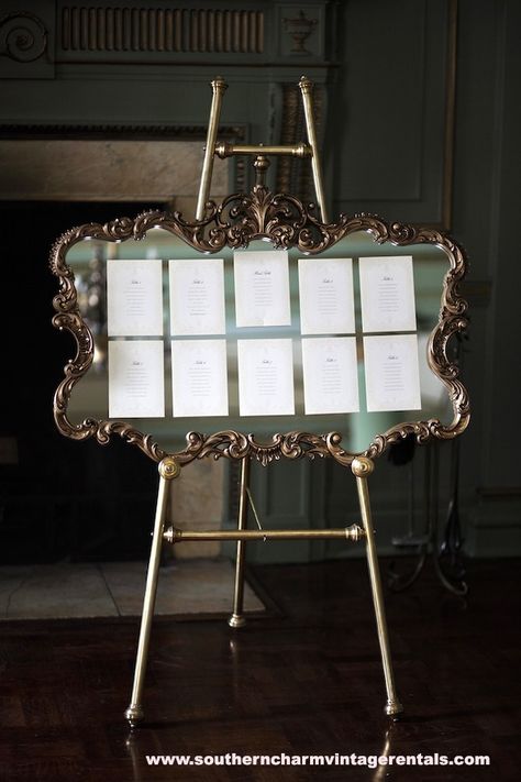 Elegant Seating Chart. French Gold Mirror and brass easel by www.southerncharmvintagerentals.com Ferris Wheel Press - Stationery Mirror Wedding Decor, Welcome Chart, Gold Mirror Wedding, Elegant Seating Chart, Ferris Wheel Press, Vintage Gold Mirror, French Chateau Wedding, Boho Mirror, Music Stands