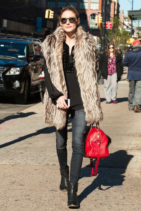 Olivia Palermo wears a brown shaggy faux fur vest over a black blouse with skinny jeans and black booties. Fur Vest Outfits, Flowing Blouse, Olivia Palermo Style, The Zoe Report, Long Vest, Embellished Blouse, Long Vests, Olivia Palermo, Faux Fur Vests