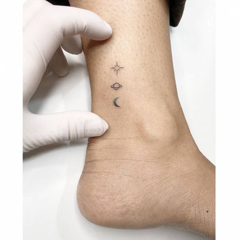 Saturn Ankle Tattoo, Moon And Saturn Tattoo Minimalist, Moon To Saturn Tattoo, Saturn And Moon Tattoo, Small Saturn Tattoo, Moon Saturn Tattoo, Saturn Tattoo Minimalist, Saturn And Moon, Moon And Saturn Tattoo