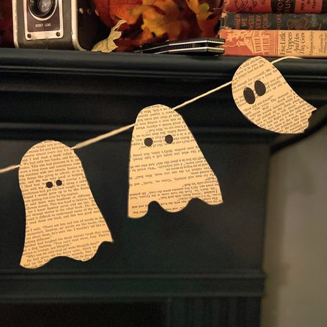 "Happy ghost garland handmade out of vintage book pages on high-quality twine. Approximately 4.5' long, with ghosts spaced approximately 3.5\" apart." Fabric Ghost Garland, Fall Decor Handmade, Paper Ghost Garland, Halloween Handmade Decorations, Fall Craft Night Ideas, Ghost Garland Diy, Halloween Function, Halloween Garland Diy, Library Friends