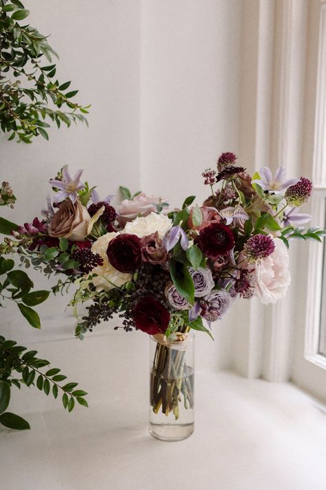 Lush bridal bouquet with floral colors in mauve, plum, eggplant, and cream. Bridal bouquet with texture and airy details. Fall wedding bouquets in muted colors. Bridesmaid’s bouquets consisting of roses, wildflowers, berries, and greenery. Design by Rosemary & Finch Floral Design in Nashville, TN. Plum Wedding Bouquet Fall, Plum And Lavender Bouquet, Fall Plum Wedding, Mauve Bouquet Wedding, Fall Lavender Wedding, Mauve And Plum Wedding, Plum Bouquet, Plum Wedding Colors, Mauve Bouquet