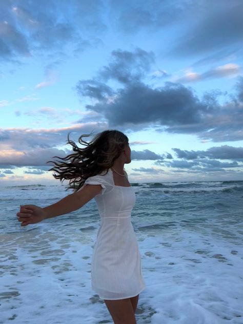 Sunset Dress Pictures, Standing In A Nice Dress Staring At The Sunset, White Dress Sunset Photoshoot, 15 Photoshoot Ideas Casual, Beach Pictures In Dress, Beach Dress Pictures, Beach Pictures Dress, Sundress Photoshoot, Senior Picture Ideas Beach