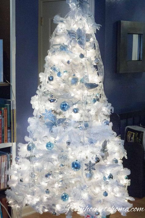 I love these elegant and glam Christmas tree ideas. With trees decorated in blue, white, pink, gold, silver, red and even black, there's all kinds of unique Christmas tree decorating ideas. #fromhousetohome #christmasdecor #christmas #christmastree  #diychristmas White And Blue Christmas Tree, Classy Christmas Tree, White And Blue Christmas, Glamorous Christmas Tree, Deco Violet, Christmas Tree Colour Scheme, White Xmas Tree, Blue Christmas Tree Decorations, Glam Christmas Tree