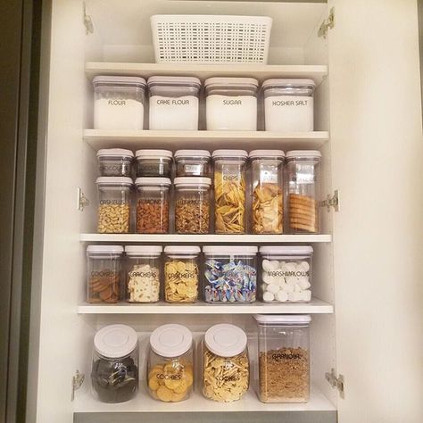 A pantry full of @oxo pop containers definitely warms our hearts.  What's not to love about this set up!? Everything is labeled and contained and the empty bin on top is for backstock.  #pantrygoals #pantryorganization #kitchengoals Oxo Pantry Organization, Oxo Pop Containers Ideas, Oxo Pop Containers Pantry, Clear Bin Pantry Organization, Pantry Organization Clear Bins, Oxo Containers, Oxo Pop Containers, White Pantry, Dream Pantry