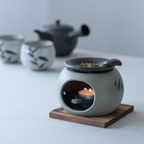 MUSUBI KILN on Instagram: "Have you ever experienced Chakoro Tea Incense Burner? Enjoy the rich aroma of Japanese tea leaves with an authentic Japanese Chakoro Tea Incense Burner. A Chakoro spreads the relaxing aroma of Japanese tea in its surroundings by slowly roasting Japanese tea leaves and twigs over a small flame. Relax at home with the wonderful aroma and the beautiful design of an authentic Japanese Chakoro. It was a new experience and very relaxing! ******************** 【How to Wooden Tea Set, Japanese Candles, Japanese Incense, Japanese Gifts, Traditional Ceramics, Tealight Candle, Ceramic Teapots, Red Clay, Potters Wheel