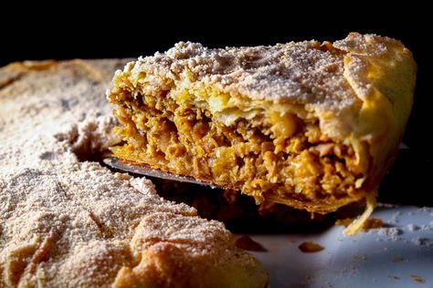 A Moroccan appetizer, bastilla is a crusty flaky pie usually filled with pigeon or chicken and cooked in sweet and salty flavors and spices. Pigeon Pie, Steak Pie, Phyllo Pastry, Honey Baked, Almond Chicken, Culinary Classes, Chicken Pie, Ethnic Food, Pastry Shells