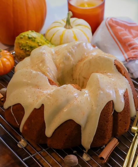 Delicious moist pumpkin bundt soaked with dark rum and topped with maple glaze! #fall #pumpkin #bundtcake #cake #food #recipe #fallrecipes #autumn #rum Pumpkin Spice Rum Cake, Rum Bundt Cake, Pumpkin Bundt, Pumpkin Bundt Cake, Rum Cake, Maple Glaze, Dark Rum, Spiced Rum, Moist Cakes