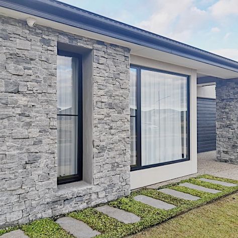 Winter Night Stone Cladding. Bringing stone feature outside of the house rather than having a plain colour on your wall #stonecladding  #stonefeature #stonewall #winternightstone #charcoalcladding #smilingrock #victoria #stonedesign #home #outside Stone Cladding Exterior, Small Pools Backyard, Contemporary Bungalow, Outside Of The House, House Plans South Africa, Stone Exterior Houses, Home Outside, Modern Fence Design, House Cladding