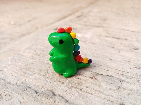 Discover Easy Clay Date Ideas to Bond Over Creativity Simple Clay Dinosaur, T Rex Clay Sculpture, Tiny Clay Dinosaur, Small Clay Dinosaur, Clay Art Dinosaur, Clay Crafts Dinosaur, Mini Clay Dinosaur, Cute Clay Dinosaur, Easy Clay Dinosaur