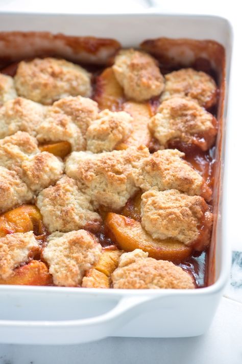 Peach Cobbler from Inspired Taste - Perfectly capture the spirit of fall with this easy recipe for peach cobbler. Spiced Peaches, Easy Peach Cobbler Recipe, Cobbler Easy, Baked Peach, Yellow Plums, Peach Cobbler Easy, Paleo Recipes Dessert, Peach Recipes, Canned Biscuits