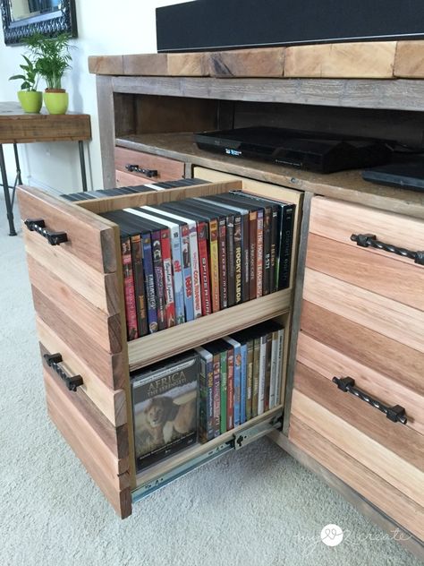 Not the console idea I have in mind, but these media storage drawers are pretty brilliant. Dvd Storage Ideas Diy, Dvd Storage Ideas, Dvd Storage Cabinet, Diy Dvd Storage, Diy Dvd, Reclaimed Wood Media Console, Tv Kastenwanden, Tv Corner, Tv Stand With Drawers