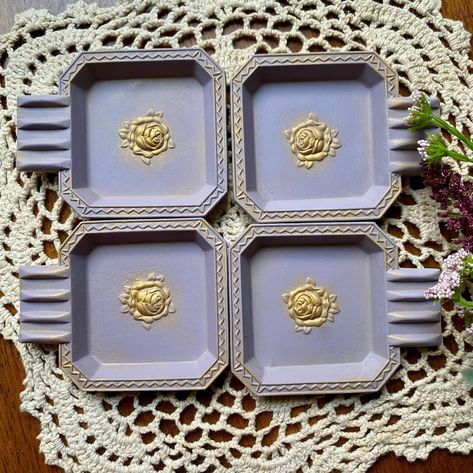 It’s #thriftythursday and I wanted to share these vintage ashtrays that I repurposed to be used as trinket dishes. They would be a pretty addition for a vanity or nightstand to hold jewelry or just sit around and be eye candy. 💍💜 I found these at a yard sale and couldn’t pass them up. Swipe to see what they looked like before. They actually are fairly heavy for their size at almost 2 oz of metal. I painted them english lavender, added some gilded gold and several coats of matte sealer. What... Vintage Ashtrays, English Lavender, Vintage Ashtray, Ashtrays, Gold Gilding, Yard Sale, Trinket Dishes, Being Used, Eye Candy