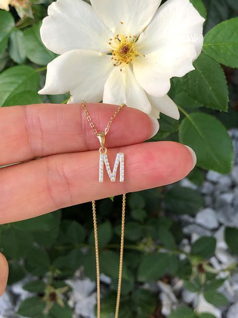 925 Sterling Silver Cz Initial Letter M Pendant Necklace - Metal: 925 Sterling Silver (Finish: Gold Plated) - Stone: Clear Cubic Zirconia, Round, Pave - Shape: Initial Letter M - Pendant Dimension: 8.8mm(0.35 in) x 7mm(0.28 in) x 1mm, Thickness 1mm - Light Cable Chain: 18" Adjustable (16" + 1" + 1"), Spring Ring Clasp - Color: Gold Letter M Necklace, Initial M, M Necklace, Dainty Initial Necklace, Jewelry Board, Initial Necklace Gold, Letter M, Initial Letter, Initial Letters