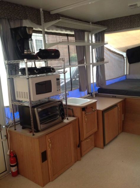 The inside of our 2001 Starcraft Spacemaster with our 4' shelving mod! Fleetwood Pop Up Camper, Tent Trailer Camping, Best Pop Up Campers, Pop Up Remodel, Pop Up Camper Ideas, Pop Up Camper Remodel, Camper Mods, Popup Camper Remodel, Pop Up Camping