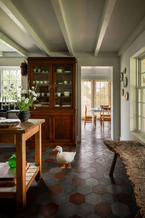 Tour the Pastoral Martha’s Vineyard Abode of Designer Ariel Ashe | Architectural Digest | Architectural Digest Moroccan Floor Tiles, England Farmhouse, Marie Von Behrens, New England Farmhouse, Outdoor Tub, Monday Inspiration, Custom Headboard, Moroccan Floor, Kitchen Ceiling