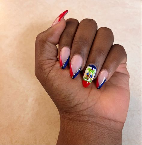 a black girl’s hand folded into a slight fist to show off her nails. On her nails there is a Haitian flag painted on the ring finger and the rest of her nails has a nude pink base with blue and red on the edges of the nail to the tip. There is a gold stripe also added to the inner part of the v-shaped Edge of the blue and red color created. Haitian Flag Nails, Haitian Nail Designs, Haitian Flag Day Outfit Ideas, Haiti Nails, Cuban Nails, Dominican Republic Nails, Puerto Rico Nails Designs, Puerto Rican Nails, Haiti Aesthetic