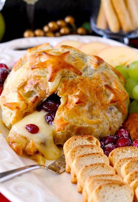 Quick, easy, luxurious and totally scrumptious. This Brie and Cranberries Baked in Puff Pastry is the perfect appetizer for the holiday season! Brie Recipes Appetizers, Baked Brie Appetizer, Baked Brie Recipes, Cranberry Baking, Brie Puff Pastry, Brie Appetizer, Brie Recipes, Cheese Puff Pastry, Lemon Blossoms