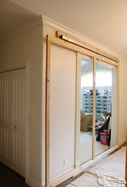 how to build a sliding wall in your home, home decor, how to Inside Sliding Doors, Diy Fake Wall, Diy Secret Room, Secret Room Doors, Fake Wall, Fake Walls, Moveable Wall, Diy Sliding Door, Movable Walls