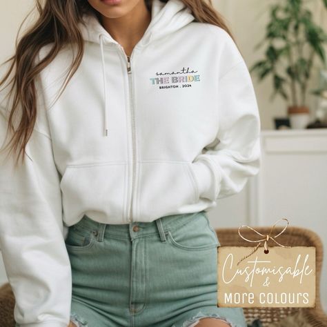 Bachelorette Zip-up Hoodies, Personalized Bridesmaid Proposal, Full Zip Hoody, Bride Wedding Honeymoon Jacket, Bridal Shower Gifts #PersonalisedJacket #WeddingShowerGift #BridalZipUp #BrideTravelOutfit #BacheloretteParty #BrideTeamHoodie #HoneymoonTravel #BridalShowerGift #BridalPartyShirt #CustomHenParty Lesbian Wedding Gifts, Wedding Honeymoon, Bridal Party Shirts, Bridesmaids Personalized, Team Bride, Personalized Hoodies, Zip Up Hoodies, Bridesmaid Proposal, Bridal Shower Gifts