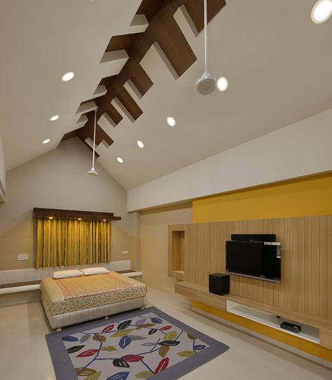 In a city starved of green spaces, this penthouse in Thane, Maharashtra, boasts of expansive 10,000 sq ft terrace garden surrounding just 5,000 sq ft of actual livable space… Check it out and leave us your feedback. http://inditerrain.indiaartndesign.com/2014/06/garden-glory_13.html Pitched Roof Design, Sloping Ceiling, Small House Design Architecture, Sustainability Design, Pitched Ceiling, Interior Reference, Sloping Roof, Villa Ideas, Ceilings Design