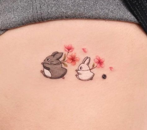 Small Ghibli Tattoo Simple, Tiny Sailor Moon Tattoo, Studio Ghibli Totoro Tattoo, Chibi Totoro Tattoo, Delicate Disney Tattoo, Cute Studio Ghibli Tattoos, Calcifer Tattoo Black And White, Studio Ghibli Matching Tattoo, Suzume Tattoo