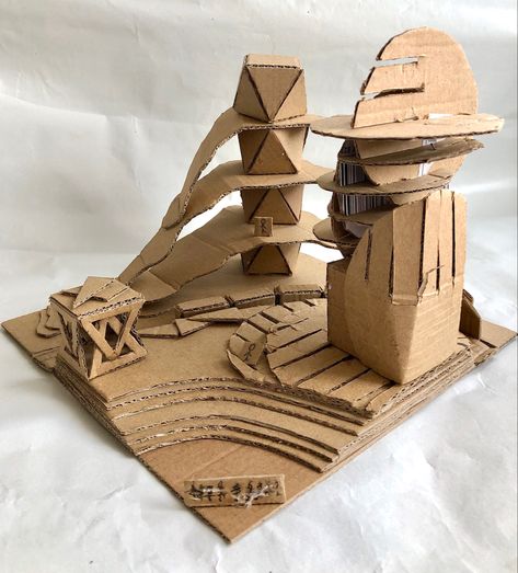 Cardboard model of a city. It is a concept of a design translated into a model using cardboard and modeling tools. It has a train and a station made of cardboard. Aesthetic Artwork, Cardboard Model, Wood Building, Diagram Design, Cardboard Art, City Landscape, Cardboard Crafts, Architecture Sketch, Concept Architecture