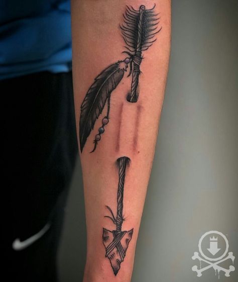 Rad black and grey arrow tattoo done by Jose Bolorin. #12ozstudios #team12oz #tattoo #tattoos #tattooed #tattooing #tattooart #tattooartist #art #artwork #tattooartwork #tattooshop #tattoostudio #tattooist #tattooism #tattooer #ink #inked #blackandgrey #blackandgreytattoo #blackandgreytattoos #arrow #arrowtattoo Arrow Tattoo Men Forearm, Arrow Tattoo Men Leg, Native American Tattoos Arrow, Indian Arrow Tattoo Men, Arrow With Feather Tattoo, Native American Tattoos For Men, Native American Arrow Tattoo, Native Bow And Arrow Tattoo, Arrow Tattoo Men