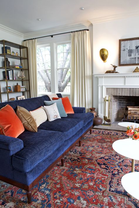 Living Room || Taylor Jacobson Interior Design Blue Vintage Rugs In Living Room, Living Room Decor With Animal Mounts, Red Blue Rug Living Room, Blue Sofa Red Rug, Red Rug Blue Couch, Red And Navy Living Room, Blue Couch Red Rug, Living Room Persian Carpet, Blue And Red Interior Design