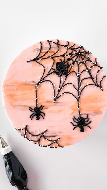 Eat Cake Be Merry - Liz Shim on Instagram: "Usually I’m terrified of spiders but they aren’t so scary when they are made of buttercream! 🕷🕸 Here’s a little web design set against a Halloween sunset. Everything was piped with tip 3 and I used white nonpareils to glam up the web. Some ppl said it looks like dew and others said it looks like spider eggs, ekkk!!! . . . . #cake #cakedecorating #cakedesign #spidercake #spiders #halloween #piping #buttercream #buttercreamcake #halloween" Halloween Cake Design, Spider Web Cake, Halloween Cakes Easy, Spider Eggs, Piping Buttercream, Spider Cake, Spiders Halloween, Halloween Cake Decorating, Fall Cupcakes