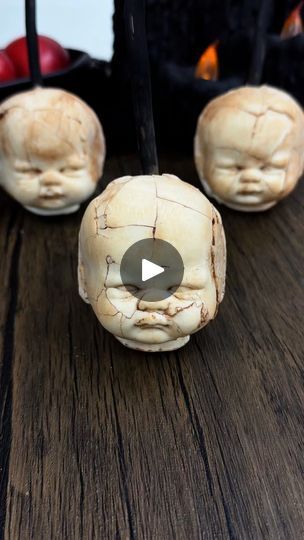 2.8M views · 41K reactions | Creepy doll head chocolate caramel apples. I dipped these in red colored caramel before dipping them in chocolate to make them even more terrifying. The chocolate I used is a 50/50 blend of Stover & Company eleven o one deluxe melting wafers and sweet shoppe melting wafers. I dusted them with cocoa powder for the dirty aged effect. These were frightfully delicious! #halloween #halloweentreats #spookytreats #chocolatecoveredapples #caramelapples #dippedapples #halloweenbaking #halloweenparty #halloweenpartyideas #halloweenpartyfood #halloweenfood #spookyfood #spookyseason #spookyszn #spookytreats #dippedtreats #dippedinchocolate #desserts #goth #chocolate | beautyanddasweetz | Terra Fantasy · Creepy Music Box (Dark Music) Creepy Recipes, Goth Chocolate, Creepy Music, Maria Gomez, Halloween Themed Desserts, Halloween Eats, Covered Apples, Creepy Food, Chocolate Caramel Apples