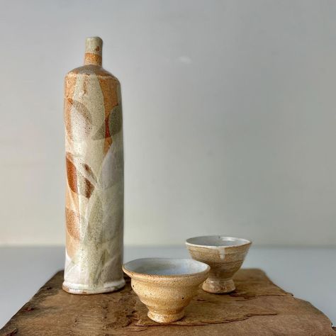 N I C O L A G I L L I S | Tall bottle and cups. The bottle has inlayed darker clay in the body and is hand built from several elements. There is a dolomite, white… | Instagram Ceramics Bottle, Ceramic Bottles, White Instagram, Ceramic Bottle, Pottery Ideas, Hand Built, Handmade Ceramic, The Body, Handmade Ceramics