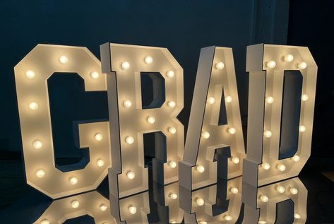 This Party Decor item by Magazey has 55 favorites from Etsy shoppers. Ships from Ukraine. Listed on 16 Aug, 2023 Grad Letters With Lights, Grad Marquee Letters, Paint Light Bulbs, Marquee Lights Wedding, Grad Letters, Graduation Backdrop Ideas, Large Light Up Letters, Photos Backdrop, Lighted Letters