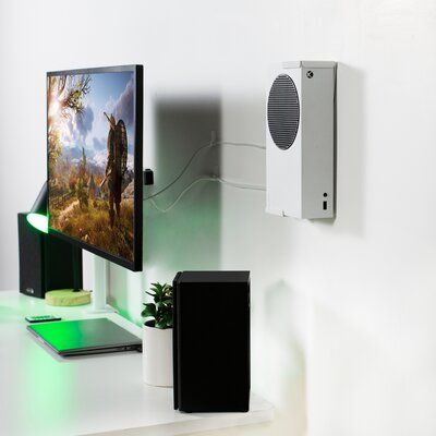 Customize Your Gaming Setup With Wall Mount For Xbox Series S (Mount-Xssu1) From Vivo! Made Of High-Grade Steel For Excellent Support, This Versatile Mount Will Hold Your Xbox S In A Safe, Convenient Location For All Your Gaming Adventures. The Bracket Design Supports Both Horizontal And Vertical Orientation, And Mounting Hardware Is Included For Wood Stud, Drywall, And Under-Desk Installation. The Open Design Keeps Your Xbox S From Overheating, And A Security Lock Provides Maximum Protection. | Xbox Setup Bedroom, Xbox Wall Mount, Xbox Series S Setup, Xbox Gaming Setup, Xbox Setup, Victorian Bohemian Decor, Game Station, Simple Floor Plans, Collection Room