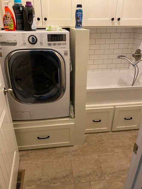 This dog wash station was added to a smaller size laundry room. Storage cabinets and drawers were also incorporated into the design. Dog Wash Tub, Laundry Room Storage Cabinets, Dog Wash Station, Shiplap Siding, Wash Station, Washing Station, Laundry Equipment, Dog Washing Station, Window Casing