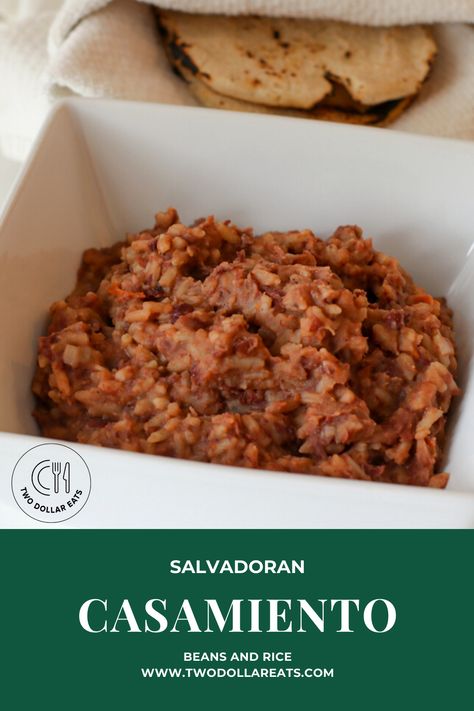 THIS CLASSIC AND DELICIOUS DISH IS ANOTHER OF MY FAVORITES FROM EL SALVADOR. CASAMIENTO MEANS, "MARRIAGE," IN SPANISH AND REFERS TO THE "MARRIAGE" OF THE RICE AND THE BEANS. THIS RECIPE IS PROVIDED BY TWO OF MY GOOD FRIENDS IN EL SALVADOR EDWIN AND KARII MOLINA AND WE ALL HOPE YOU ENJOY IT, FROM THEIR FAMILY TO YOURS. THIS IS ONE OF OUR CHEAPEST RECIPES COSTING JUST 0.86 PER SERVING OR $5.20 FOR THE WHOLE RECIPE. Casamiento Recipe, Casamiento Salvadoreno Recipe, Salvadorian Rice, El Salvador Recipes, Cheapest Recipes, El Salvador Food, Salvador Food, Salvadoran Food, Cultural Foods