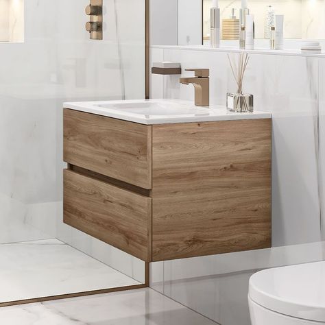 Looking for stylish and functional bathroom cabinets ideas and designs to transform your small bathroom? At Ways to Decor, we understand the challenge of maximizing space without sacrificing style. This post offers a range of space-saving cabinet solutions tailored for small bathrooms, from modern to rustic designs. 600mm Bathroom Vanity, Small Bathroom Units, Bathroom Cabinets Ideas, Vanity Unit Bathroom, Storage Solutions For Small Spaces, Bathroom Sink Cabinet, Wooden Bathroom Vanity, Bathroom 2024, Fitted Bathroom Furniture