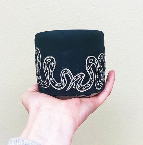 Wheel thrown ceramic cup with sgraffito snake carving on black slip Sgraffito Bowl Inside, Sgraffito Designs Easy, Sgraffito Designs Pattern, Ceramic Snake, Sgraffito Ideas, Snake Carving, Wheel Thrown Ceramics, Pinch Pot, Cup Handmade