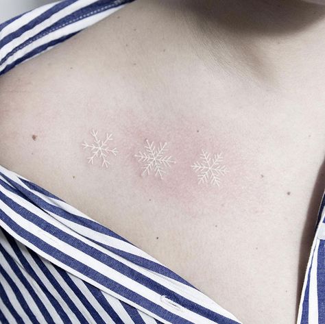 30 White Tattoo Designs That Look Like Magic Runes Snowflake Tattoo, Snow Tattoo, Tattoo White, Snow Flake Tattoo, Literary Tattoos, White Ink Tattoo, Triangle Tattoos, Arrow Tattoos, Memorial Tattoos