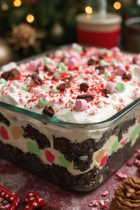 Christmas Cookie Lasagna Dessert Recipe  Ingredients  - 1 package (16 oz) sugar cookies, baked and cooled - 1 cup cream cheese, softened - 1 cup powdered sugar - 1 cup whipped topping - 1 (3.4 oz) package instant vanilla pudding mix - 2 cups milk - 1 cup holiday sprinkles  Instructions  - In a mixing bowl, beat together cream cheese and powdered sugar until smooth. Fold in whipped topping. - In a separate bowl, whisk together pudding mix and milk until thickened.  Full Recipe on... Hot Cocoa Lasagna Dessert, Christmas Cookie Lasagna Dessert, Christmas Cookie Lasagna, Desert Lasagna, Christmas Lasagna Dessert, Lasagna Desserts, Instant Pudding Recipes, Xmas Deserts, Cookie Lasagna