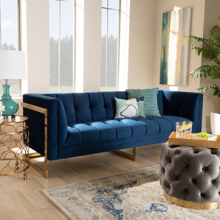 Baxton Studio Ambra Glam and Luxe Royal Blue Velvet Fabric Upholstered and Button Tufted Gold Sofa with Gold-Tone Frame Image 1 of 10 Royal Blue Couch, Blue Velvet Sofa Living Room, Velvet Sofa Living Room, Button Tufted Sofa, Navy Blue Sofa, Velvet Tufted Sofa, Gold Sofa, Blue Living Room Decor, Blue Velvet Sofa