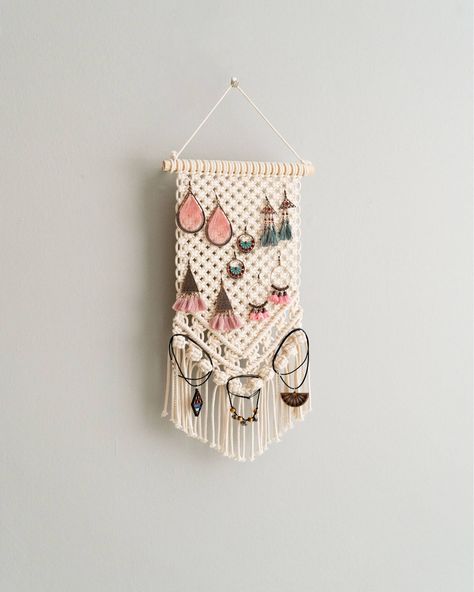 Ever wished your jewelry could hang out in style? Introducing our Macrame Jewelry Hanger—where earring storage meets minimalist decor, perfect for treating yourself or surprising your beloved one with a handmade delight! 👉 Check out more at https://beandaikon.com/products/macrame-jewelry-holder-for-boho-and-scandinavian-earring-storage #artisanmade #macramedecor #bohemiandecor #artisanalpresents #homestyling #supportlocalmakers #bohostyle #homedecorideas #bohoinspo #DiscoverEtsyFinds #home... Macrame Jewelry Hanger, Macrame Products Handmade, Macrame Functional, Macrame Jewelry Holder, Jewerly Holders, Diy Earring Holder, Boho Inspo, Treating Yourself, Earring Storage