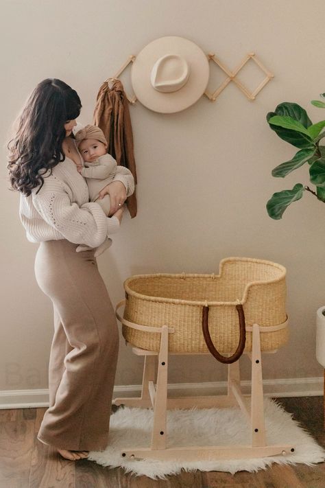 Natural Bolga Moses basket and solid wood rocking stand next to mommy holding her baby Safe Co Sleeping, Basket Stand, Moses Basket Stand, Baby Moses, Baby Moses Basket, Organic Bedding, Safe Room, Leather Colors, Nursery Room Inspiration